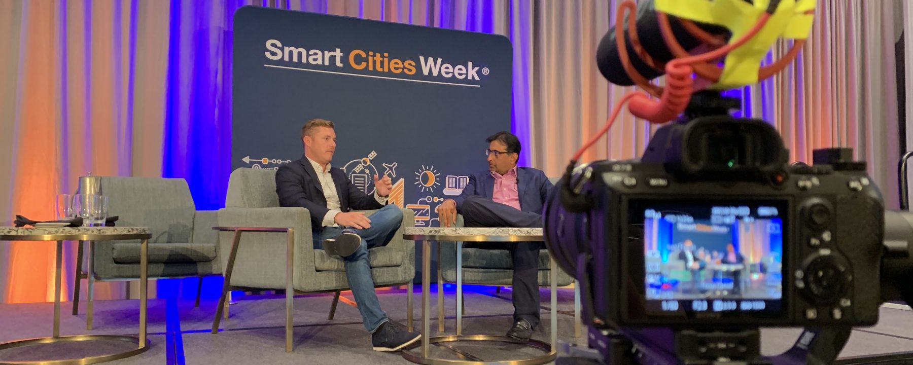 Going Green CEO Dylan Welch interviewing sustainable leaders at Smart Cities Week