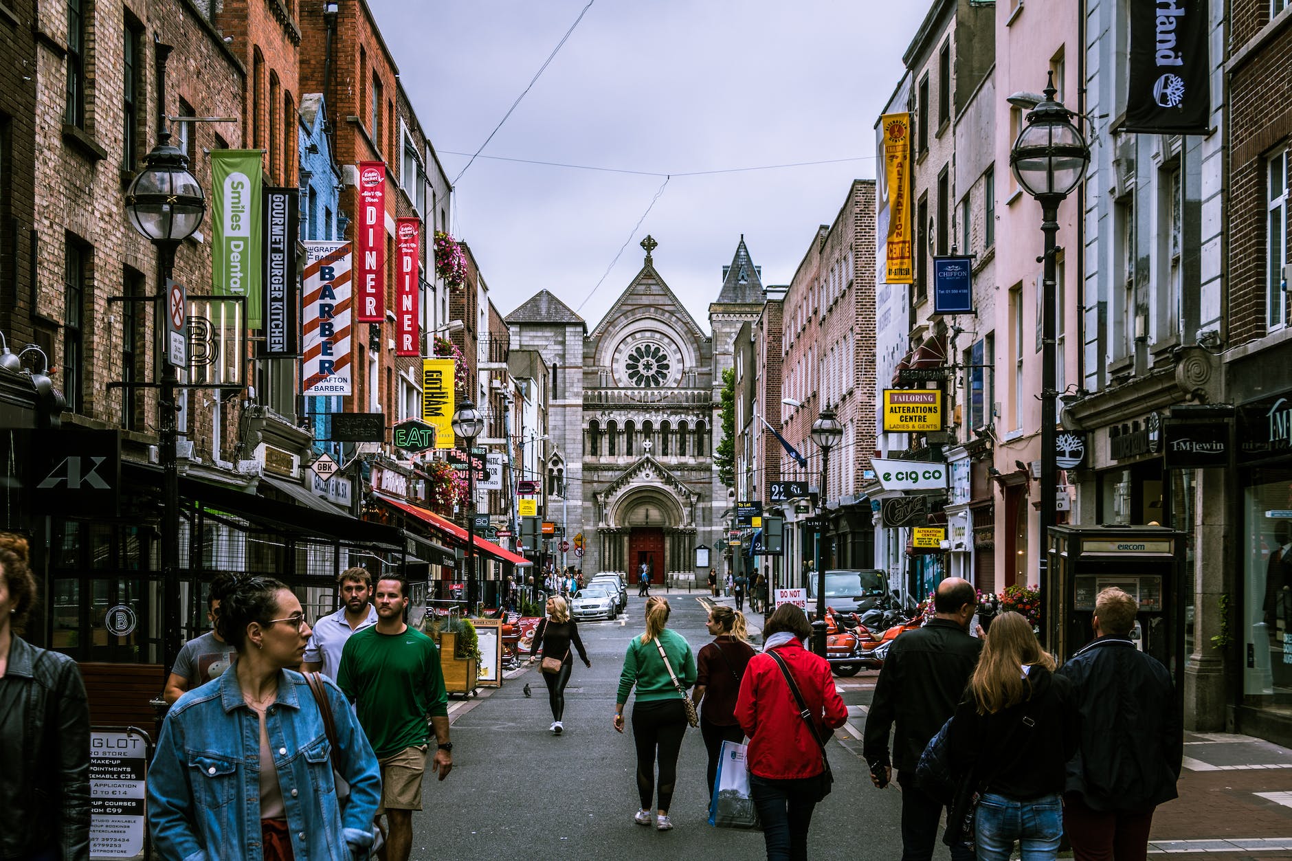 photo of people walking on street